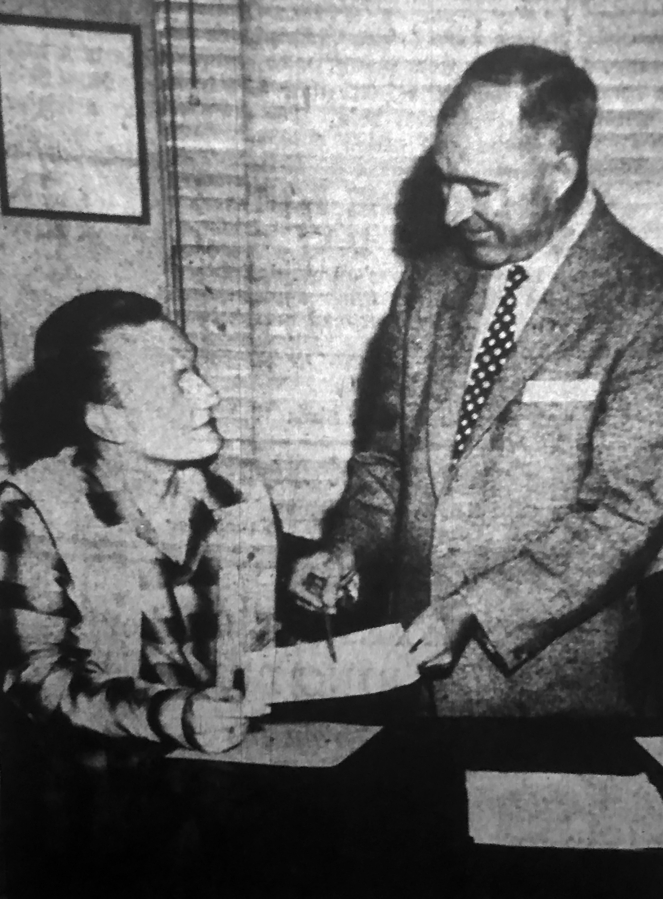 The Columbian, May 1, 1957: “Gene Nordstrom, seated, a junior at Fort Vancouver High School, was city manager of Vancouver today as students from Vancouver’s two high schools and Providence Academy participated in Student Government Day at city hall. The youthful administrator receives some pointers on the duties of his office from his official counterpart, City Manager James E. Neal. Some 30 youngsters, appointed to the city’s top administrative positions, observed city government in action during the day.