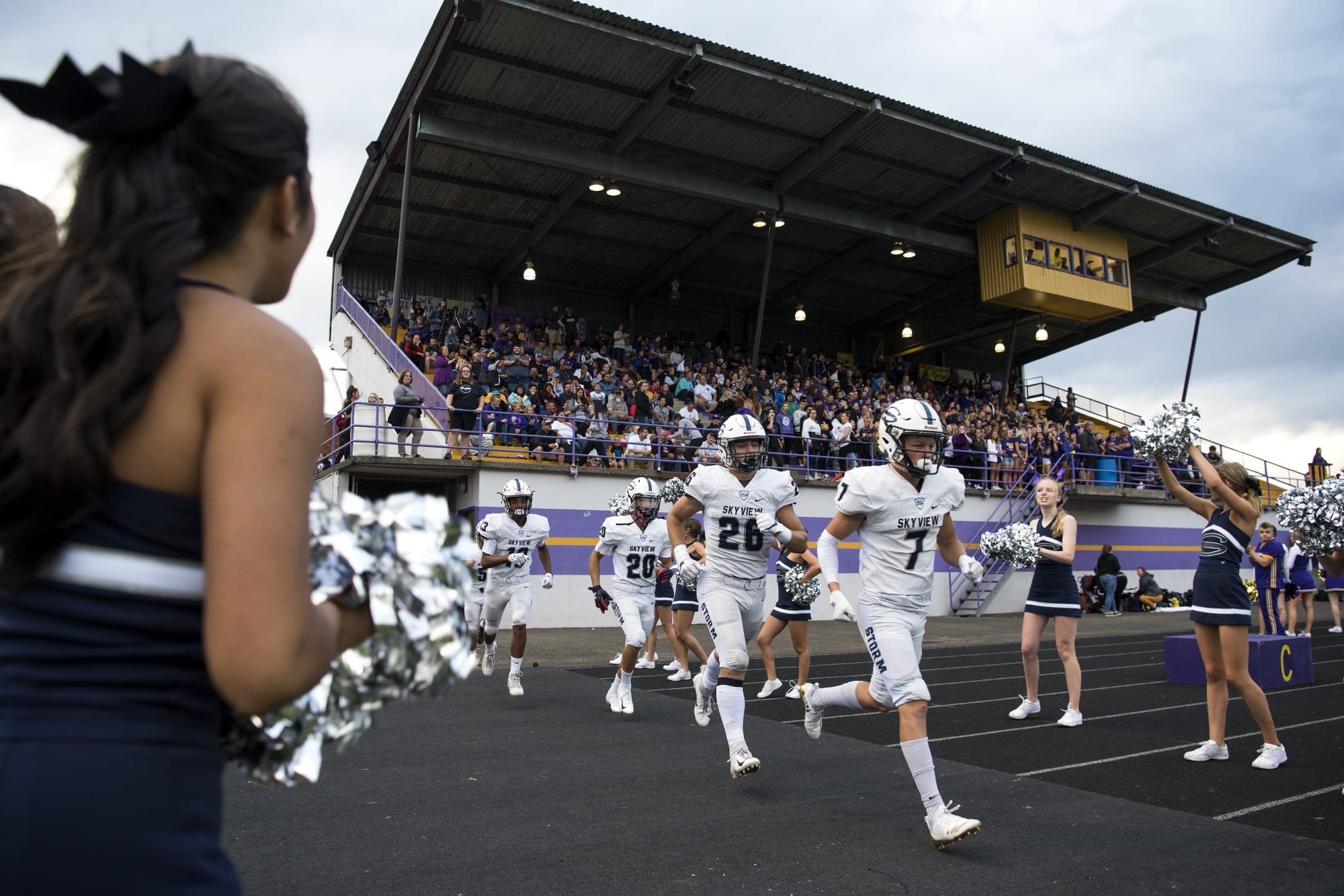 Skyview runs onto the field before Friday night's game against Columbia River at Columbia River High School in Vancouver on Sept. 7, 2018.