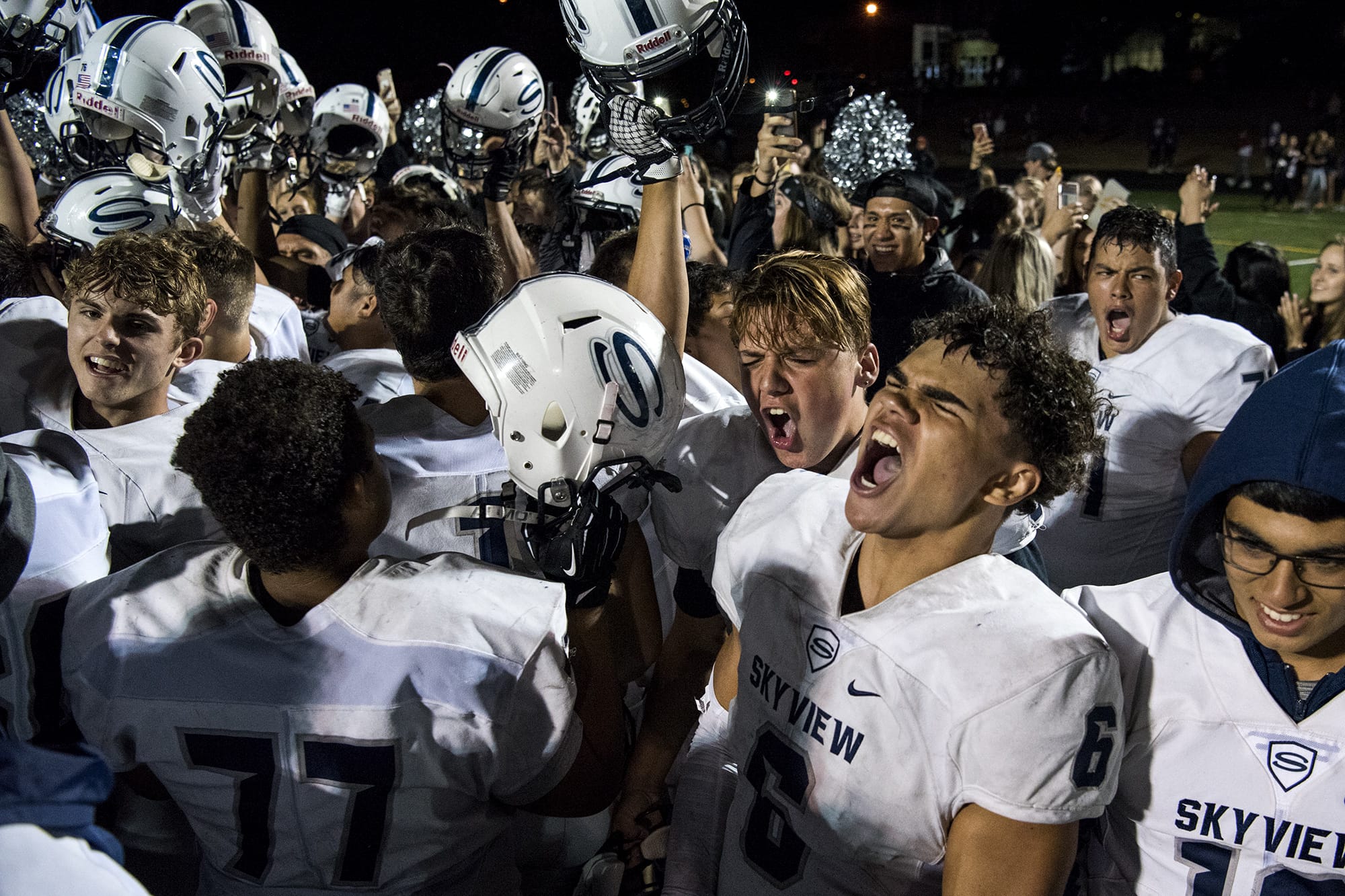 Skyview's Ahmani Williams (6) celebrates with his teammate after defeating Columbia River 34-6 in Friday night's game at Columbia River High School in Vancouver on Sept. 7, 2018.