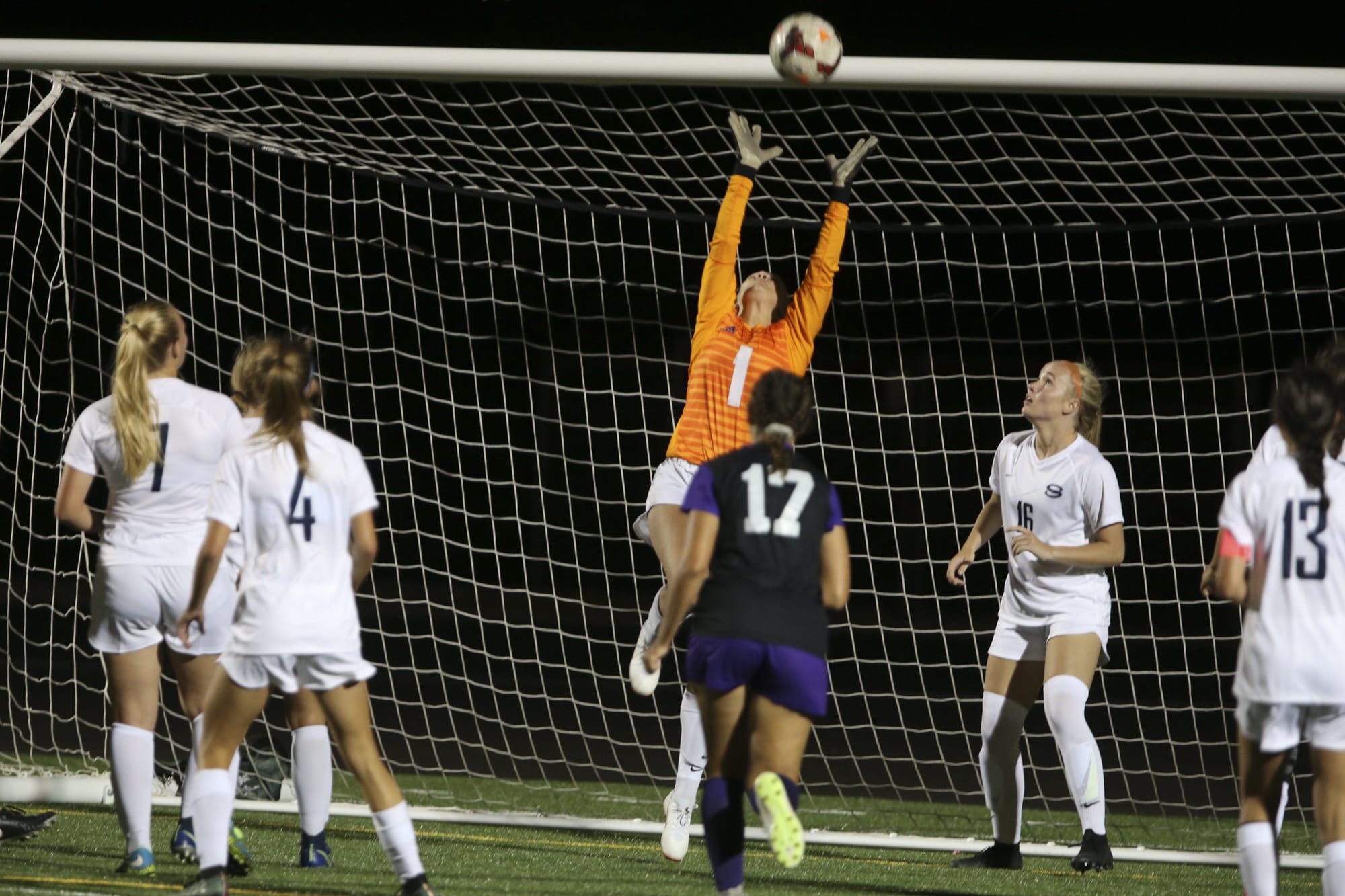 Skyview's goalkeeper Allie Thompson (1) successfully defends again a shot. Skyview beat Columbia River High School, 1-0, in the the season opener of girls soccer on Sept. 4, 2018 at Columbia River High School in Vancouver. (Randy L.