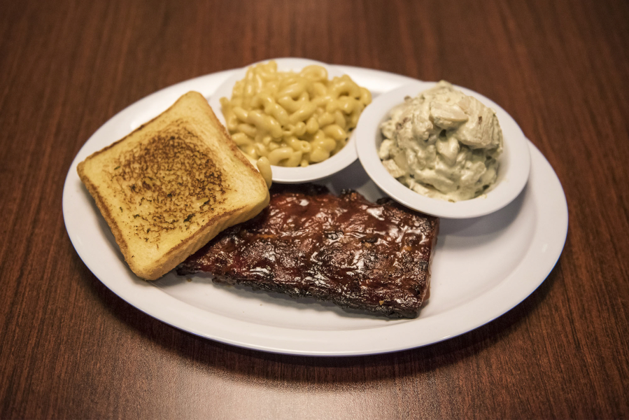 Baby Back Ribs with sides of mac n cheese, Potato Salad are seen here at Rib City on Friday afternoon, Sept. 7, 2018.