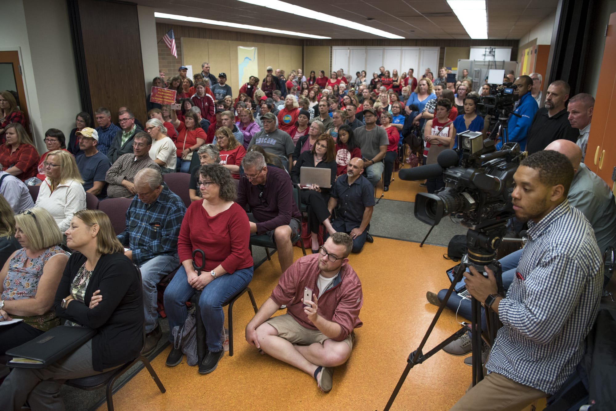 The room is filled to capacity with at least 260 people during a Battle Ground Public Schools board meeting on Monday, Sept. 10, 2018, at the Lewisville Intermediate Campus in Battle Ground.
