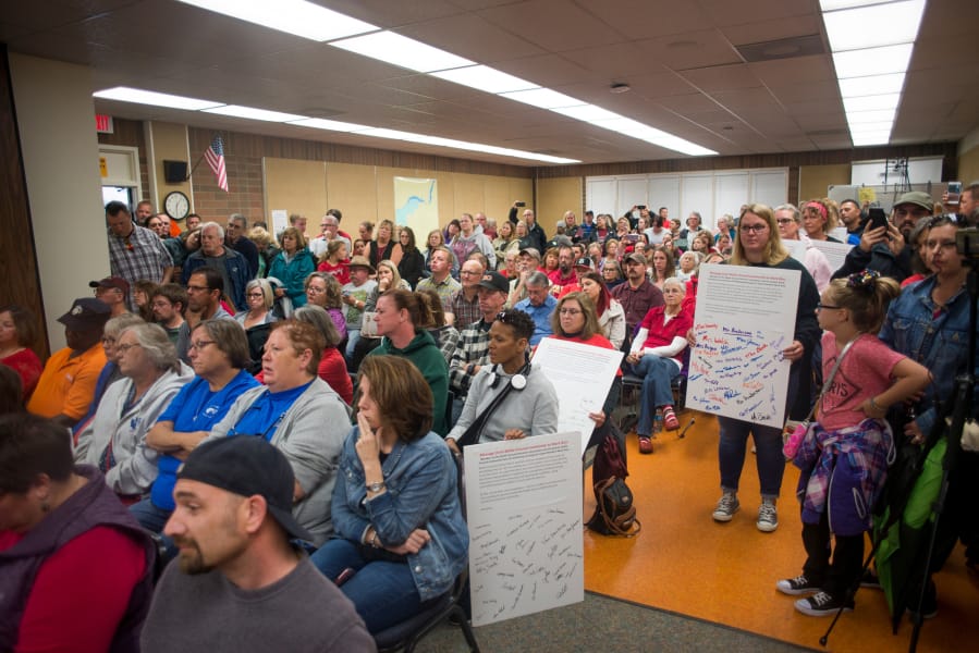 Teachers and community members fill the Battle Ground Public Schools board room during a special meeting Wednesday at the Lewisville Campus. The board voted to authorize an injunction against the district’s teachers, potentially forcing them to either return to the classroom or strike in contempt of court.