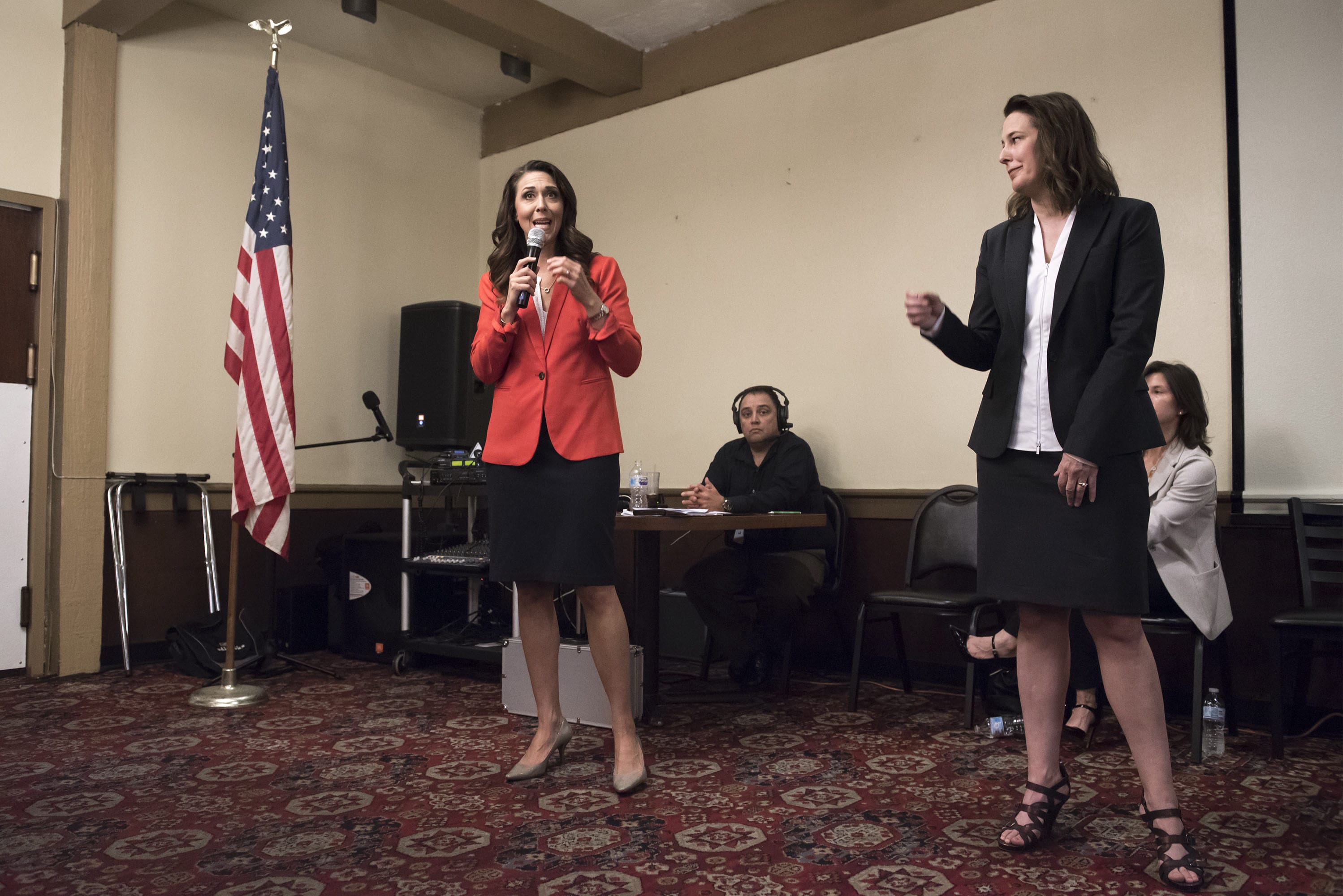 Incumbent U.S. Rep. Jaime Herrera Beutler, R-Battle Ground, left, speaks while Candidate Carolyn Long, reacts during the 3rd Congressional Candidate Forum hosted by the Woodland Chamber of Commerce at the Oaktree Restaurant in Woodland on Tuesday afternoon, Sept. 18, 2018.