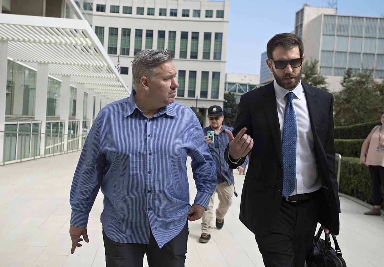 Former Vancouver pastor John Bishop, left, arrives to be sentenced for unlawful importation of a controlled substance-marijuana at the James M. Carter and Judith N Keep United States Courthouse in San Diego, Calif., on Friday morning, Sept. 21, 2018.