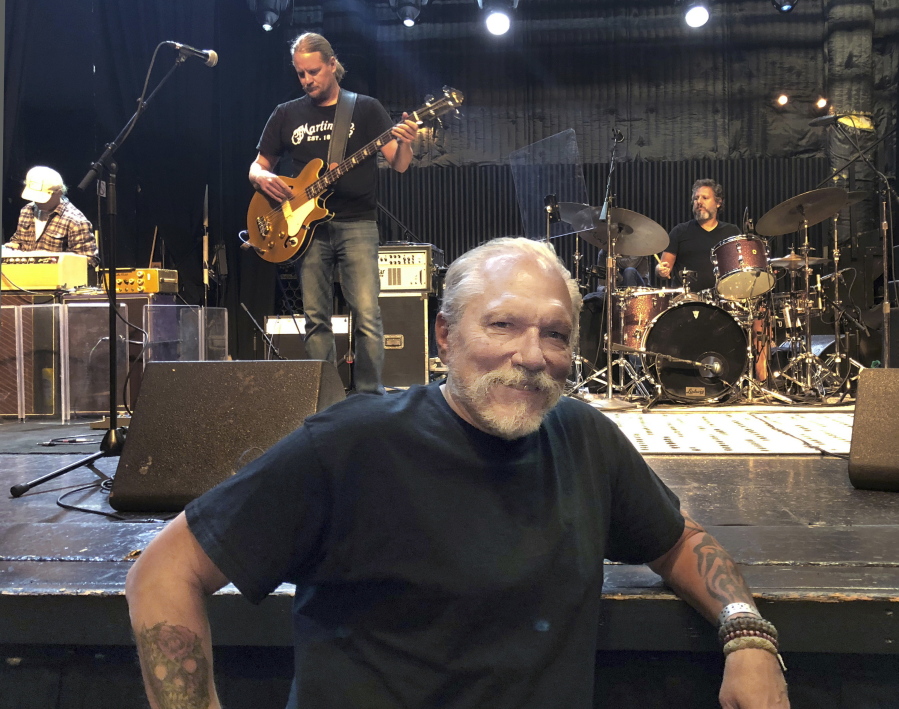 Jorma Kaukonen, 77, stands in front of the stage Sept. 6 as his Hot Tuna bandmates do a sound check before a gig at the El Rey Theatre in Los Angeles.