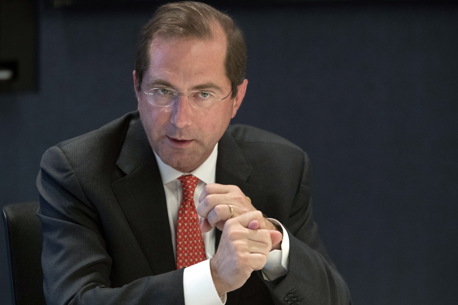 Health & Human Services Secretary Alex Azar speaks during an interview with The Associated Pressin New York. Azar the administration’s point person for efforts to lower drug prices, conceded in a recent AP interview that it will be a while before drug prices fall.