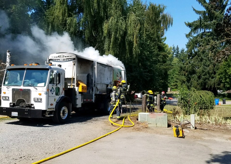 Collected materials ignited and burned a Waste Connections recycling truck Wednesday afternoon in an area north of Vancouver.