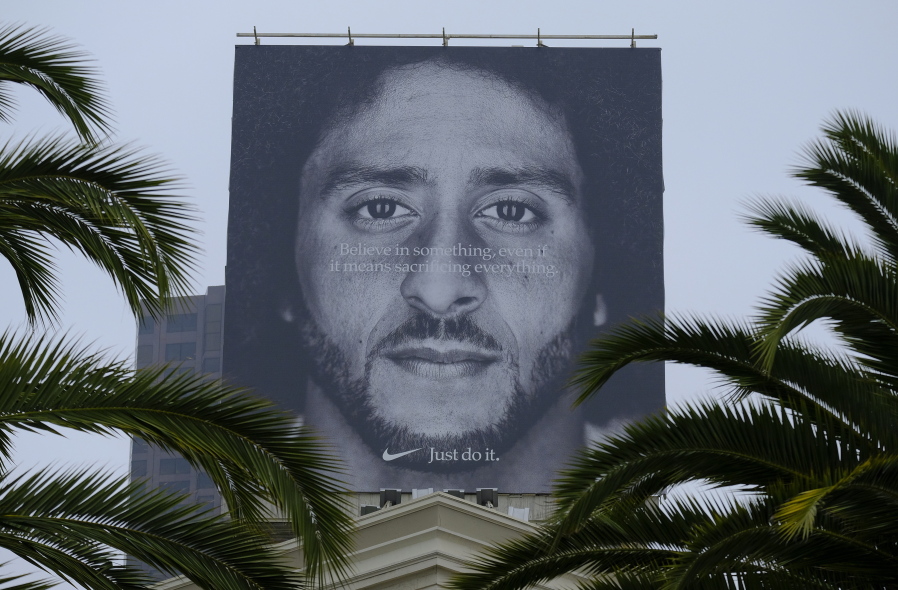 A large billboard on top of a Nike store that shows former San Francisco 49ers quarterback Colin Kaepernick at Union Square in San Francisco on Sept. 5.