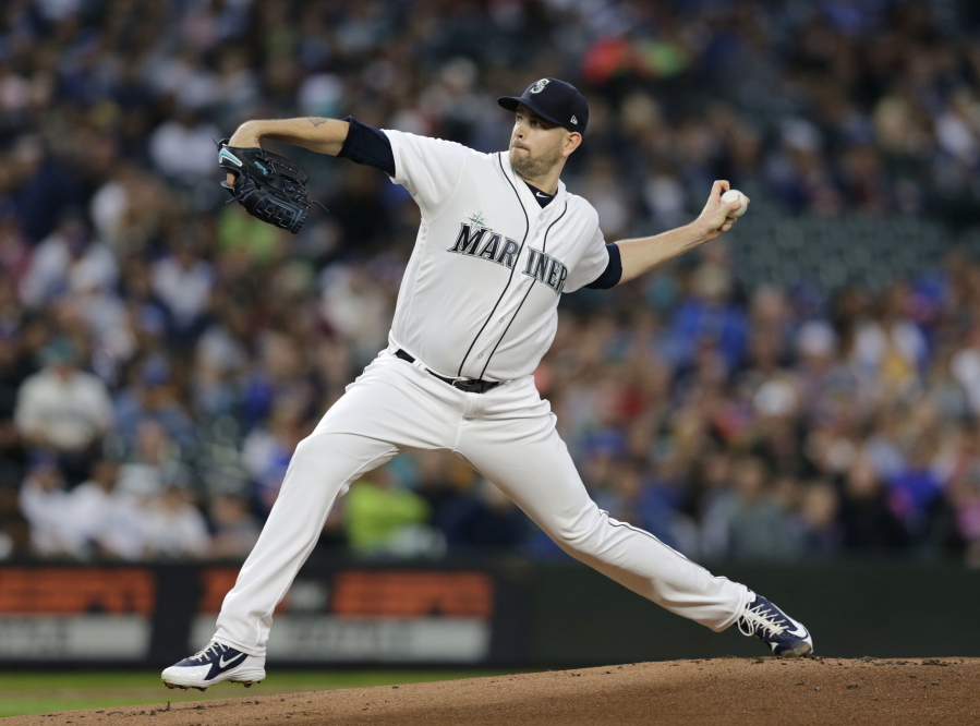 Seattle Mariners starting pitcher James Paxton works against the Texas Rangers during the first inning of a baseball game, Saturday, Sept. 29, 2018, in Seattle.