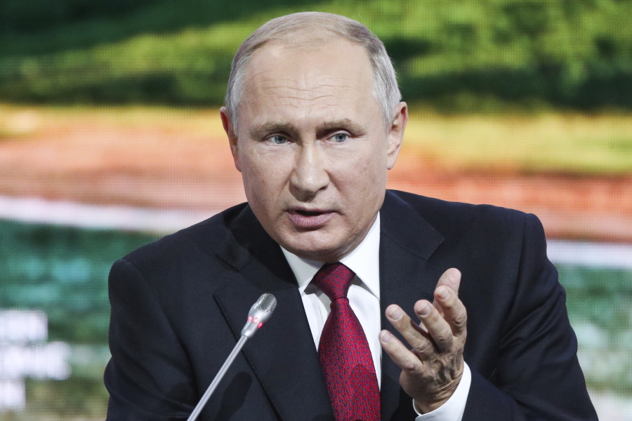 Russian President Vladimir Putin gestures as he addresses at the Eastern Economic Forum in Vladivostok, Russia, on Wednesday.