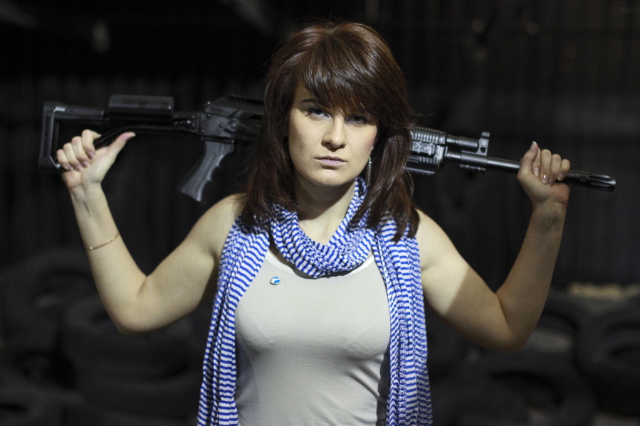 Maria Butina, a gun-rights activist, poses for a photo at a shooting range in Moscow, Russia. When gun activist Maria Butina arrived in Washington in 2014 to network with the NRA, she was peddling a Russian gun rights movement that was already dead. Fellow gun enthusiasts and arms industry officials describe the strange trajectory of her Russian gun lobby project, which U.S. prosecutors say was a cover for a Russian influence campaign. Accused of working as a foreign agent, Butina faces a hearing Monday, Sept. 10 in Washington.