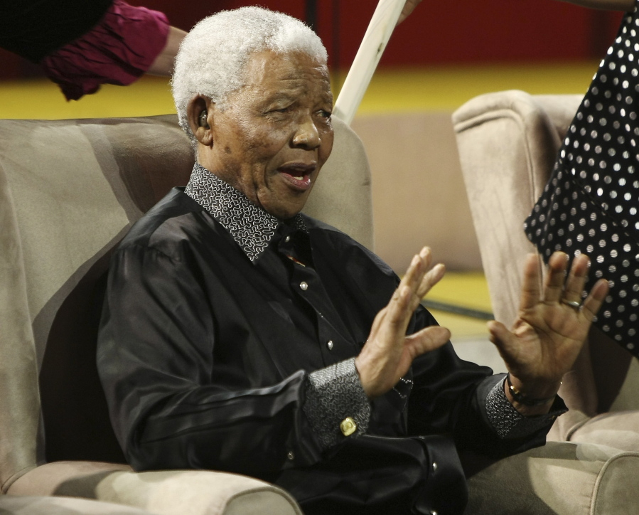 Nelson Mandela gestures during the 5th annual Nelson Mandela Lecture at the Linder Auditorium in Johannesburg, South Africa. The United Nations is seeking to harness the soaring symbolism of Mandela, whose South African journey from anti-apartheid leader to prisoner to president to global statesman is one of the 20th century’s great stories of struggle, sacrifice and reconciliation. The unveiling of a statue of Mandela, born 100 years ago, with arms outstretched at the U.N. building in New York on Monday, Sept. 24, 2018, opens a peace summit at the General Assembly.