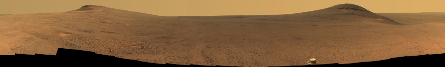 This composite image made from June 7-19, 2017 photos shows the scene from NASA's Opportunity rover outside Endeavor Crater on the planet Mars. Flight controllers have been on the alert for a message from Opportunity ever since a dust storm enveloped Mars in June and contact was lost. The storm has finally diminished in August 2018.