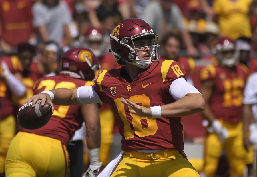 FILE - In this Sept. 1, 2018, file photo, Southern California quarterback J.T. Daniels passes during the first half of an NCAA college football game against UNLV in Los Angeles. The Trojans will attempt to avoid their first three-game losing streak in a single season since 2012 when they host unbeaten Washington State at the Coliseum in their first Friday night home game since 1999. (AP Photo/Mark J.
