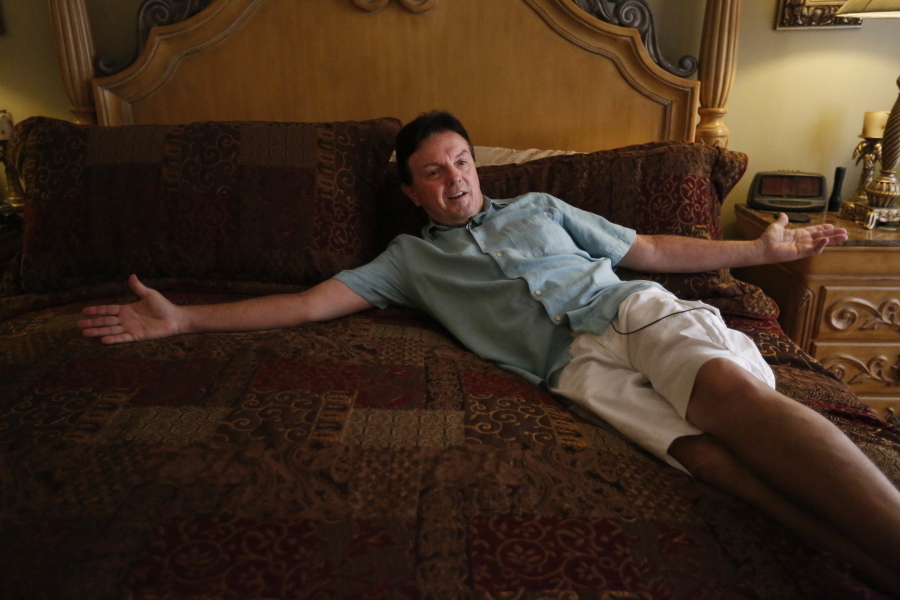 Michael Dart lies on his new waterbed from City Furniture in Coral Springs, Fla. Dart bought a waterbed in the 1980s in Rochester, N.Y. Dart said he missed its comforting warmth.