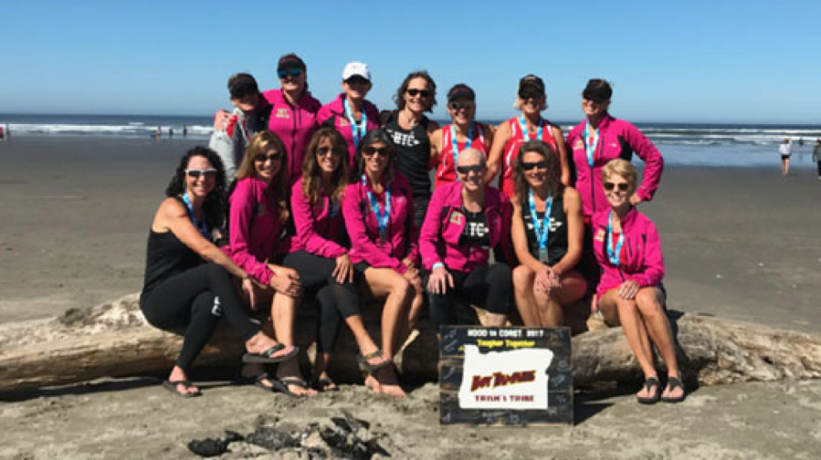 Trish Mayhew, a breast cancer survivor and oncology nurse at Legacy Cancer Institute, celebrates completing the 2017, above, and 2018, right, Hood to Coast relay with her team in Seaside, Ore.