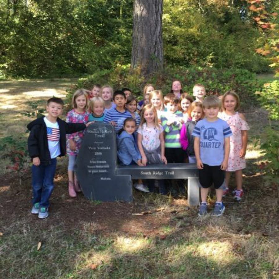 Ridgefield: First-graders in Margo Manke’s class at South Ridge Elementary School learned about plants while walking along the trail at the school’s outdoor learning space.