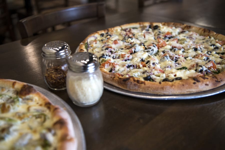 The Leonardo pizza, left, and the Donatello pizza, right, at Vancouver Pizza Company.