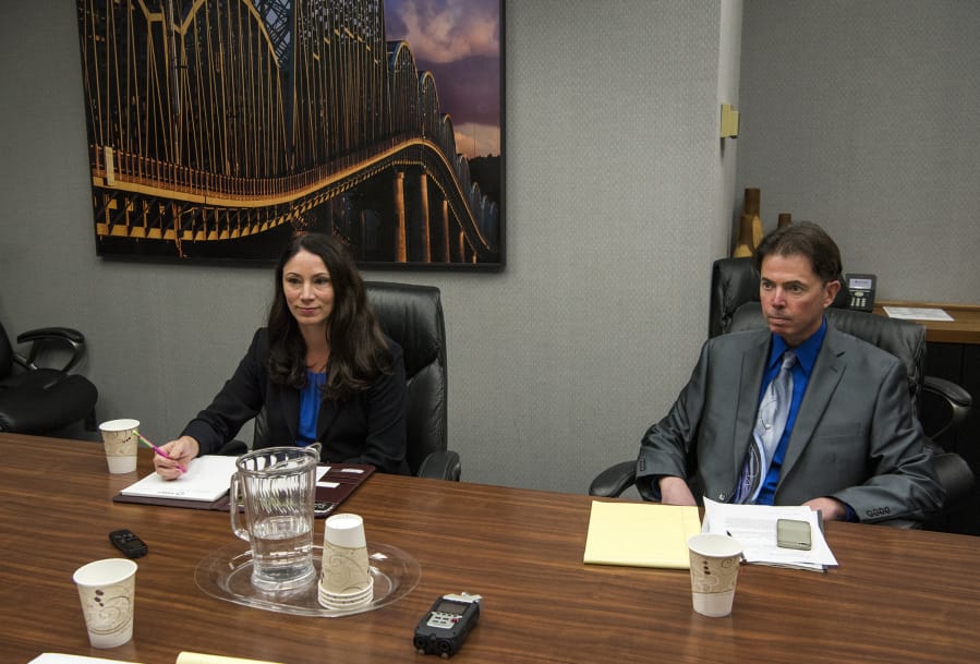 Alishia Topper, left, and Robert Hinds each make their case to The Columbian’s Editorial Board for why they should be the next Clark County treasurer.