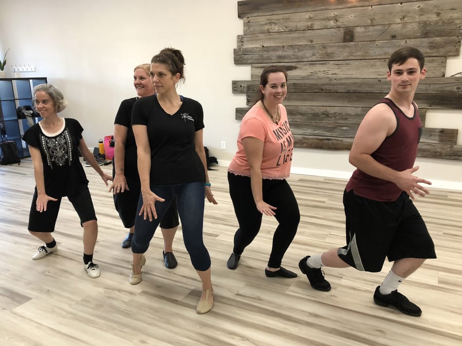 Rehearsing a song and dance for Pacific Stageworks’ upcoming Dark Times Masquerade Gala are, from left: Jeanne Reed, Pacific Stageworks president Heather Blackthorn, choreographer Demarie Day, Katrina Cannon and Robert Altieri.