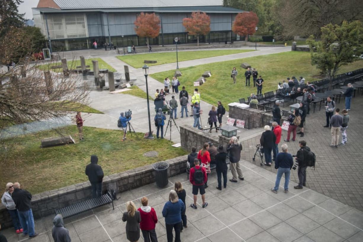 We chose to use this photo of Wednesday’s Patriot Prayer rally at WSU Vancouver because it shows the number of reporters who attended vs. the number of students and others who attended.