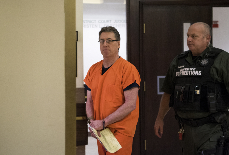 TJ Ferres, who fatally shot his friend at his home during a drunken argument in January 2017, is escorted from the Clark County Courthouse following sentencing Monday afternoon.