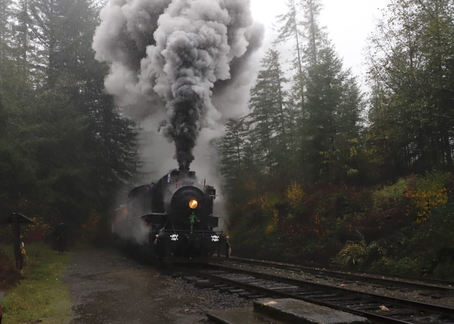 The Chelatchie Prairie Railroad organization dressed its steam train, used for weekend rides through the area, in Halloween decor over the weekend, and a Headless Horseman trotted alongside as part of the group’s spooky seasonal event.