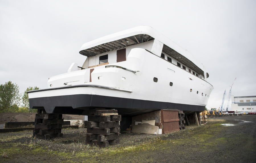 An old yacht with no names, numbers or identifying features has been sitting at what’s now called the Columbia Business Center for at least 15 years. A reader asked: ‘What’s up with that?’ After a monthlong wild goose chase, we’re still not sure.