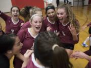 Prairie celebrates their win over Mountain View following a match at Fort Vancouver High School on Wednesday night. Prairie won the top seed in this week’s bi-district tournament.
