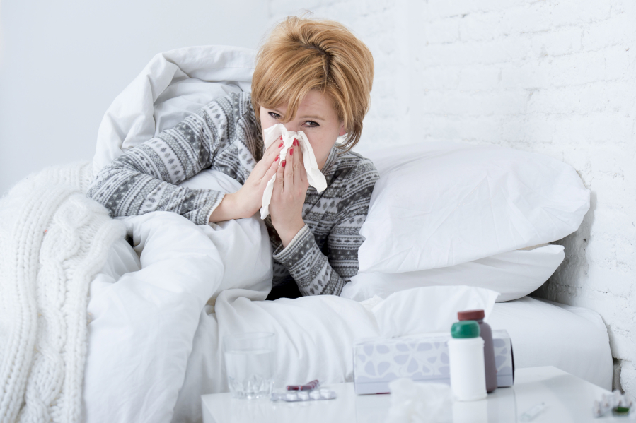 The influenza virus hijacks human cells in the nose and throat to make copies of itself.