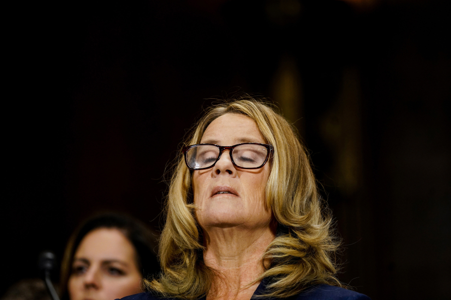 Christine Blasey Ford takes a breath at a Senate Judiciary Committee hearing Sept. 27 on Capitol Hill in Washington, D.C.