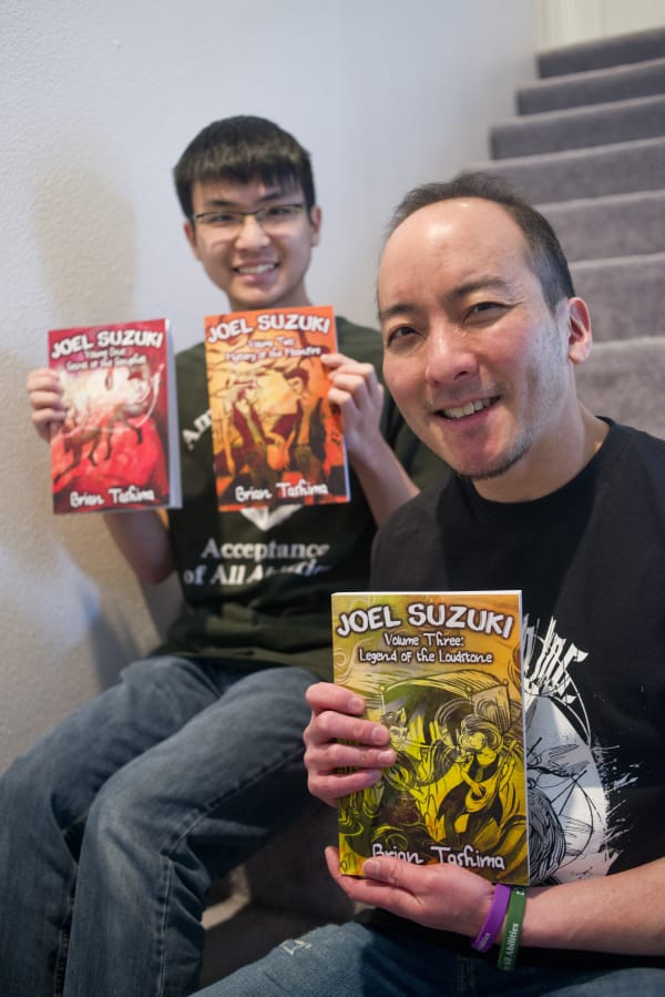 Vancouver’s Brian Tashima, right, has written several celebrated science-fiction adventure stories about a boy whose autism is a superpower — all inspired by Tashima’s teenage son, Torin, left.