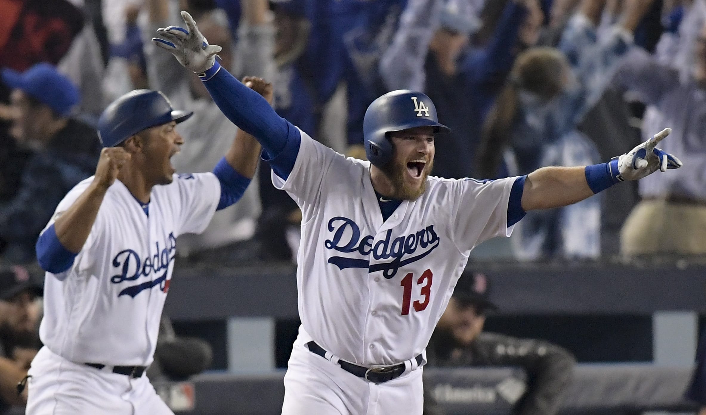 Los Angeles Dodgers' Max Muncy celebrates his walk off home run against the Boston Red Sox during the 18th inning in Game 3 of the World Series baseball game on Saturday, Oct. 27, 2018, in Los Angeles. (AP Photo/Mark J.