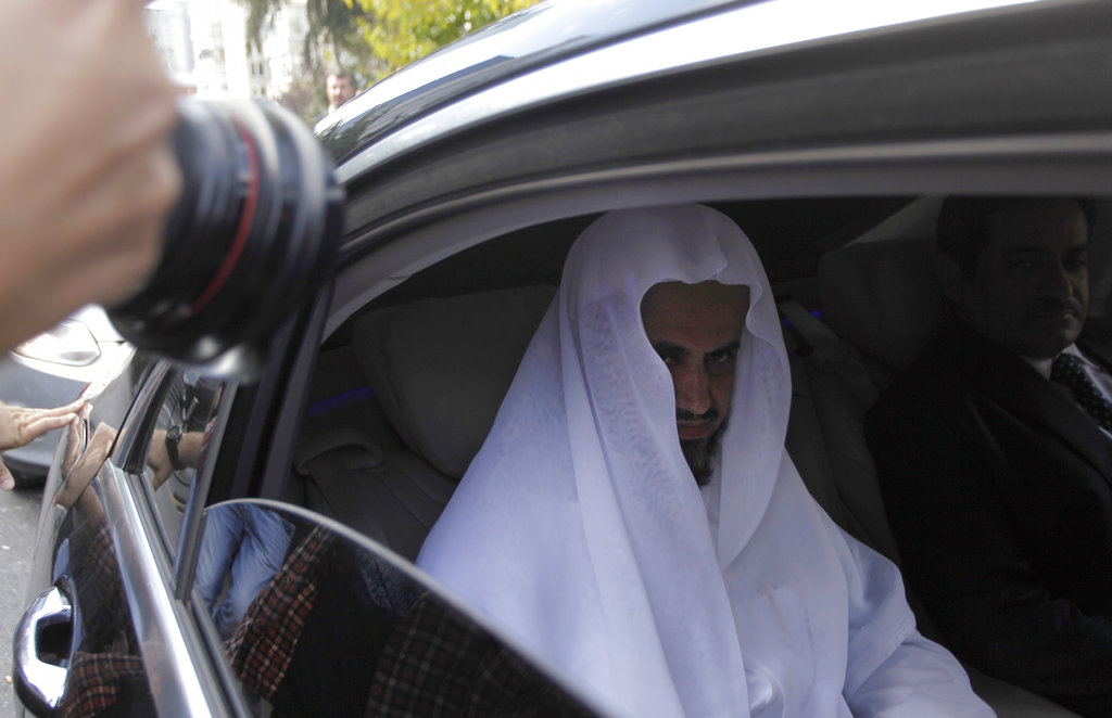 Saudi Arabia's top prosecutor Saud al-Mojeb leaves his country's consulate in Istanbul, Tuesday, Oct. 30, 2018. The Turkish fiancee of slain journalist Jamal Khashoggi has called on U.S. President Donald Trump and other leaders to ensure that his death in Istanbul is not covered up, while Saudi Arabia's top prosecutor on Tuesday visited the Saudi Consulate where officials from his government killed the writer.
