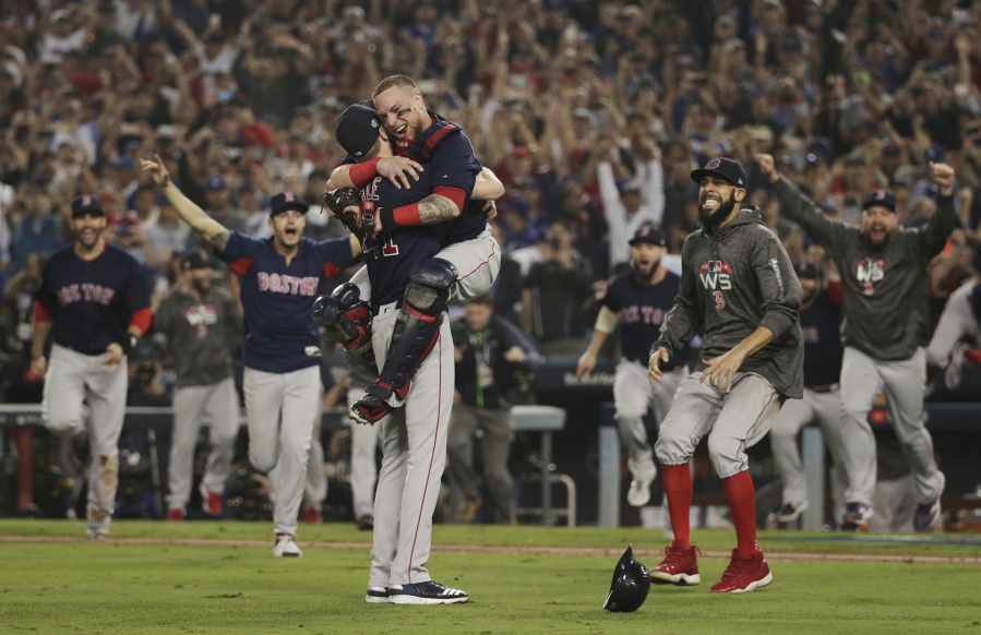 The Boston Red Sox celebrate after Game 5 of baseball’s World Series against the Los Angeles Dodgers on Sunday, Oct. 28, 2018, in Los Angeles. The Red Sox won 5-1 to win the series 4 game to 1. (AP Photo/Jae C.