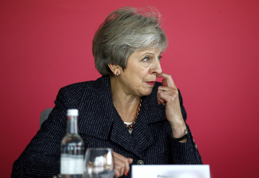 Britain’s Prime Minister Theresa May attends a roundtable meeting with business leaders whose companies are inaugural signatories of the Race at Work Charter at the Southbank Centre in London, Thursday Oct. 11, 2018.