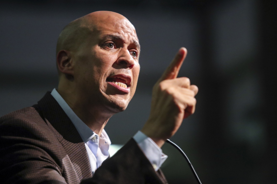Sen. Cory Booker, D-N.J., speaks to a crowd at a Get Out the Vote Rally at the RiverCenter in Davenport, Iowa, on Monday.