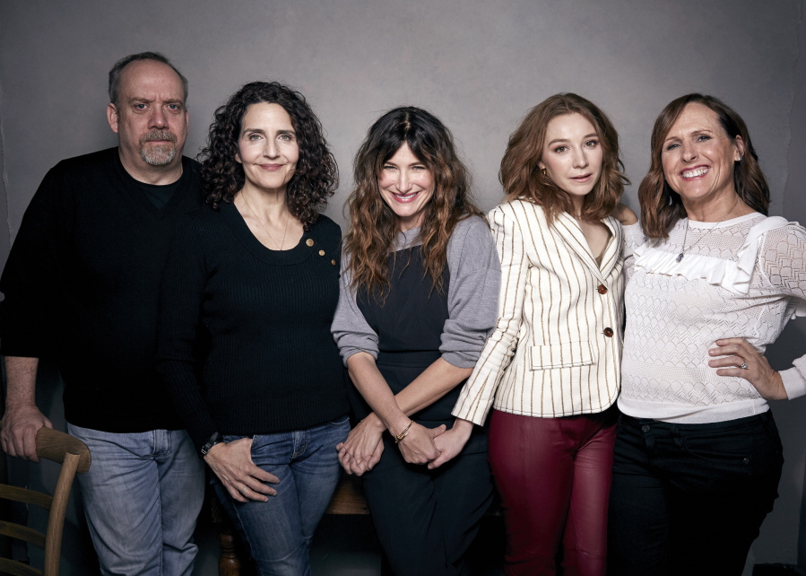FILE - In this Jan. 19, 2018 file photo, from left, Paul Giamatti, writer/director Tamara Jenkins, Kathryn Hahn, Kayli Carter and Molly Shannon pose for a portrait to promote the film “Private Life,” at the Music Lodge during the Sundance Film Festival in Park City, Utah.