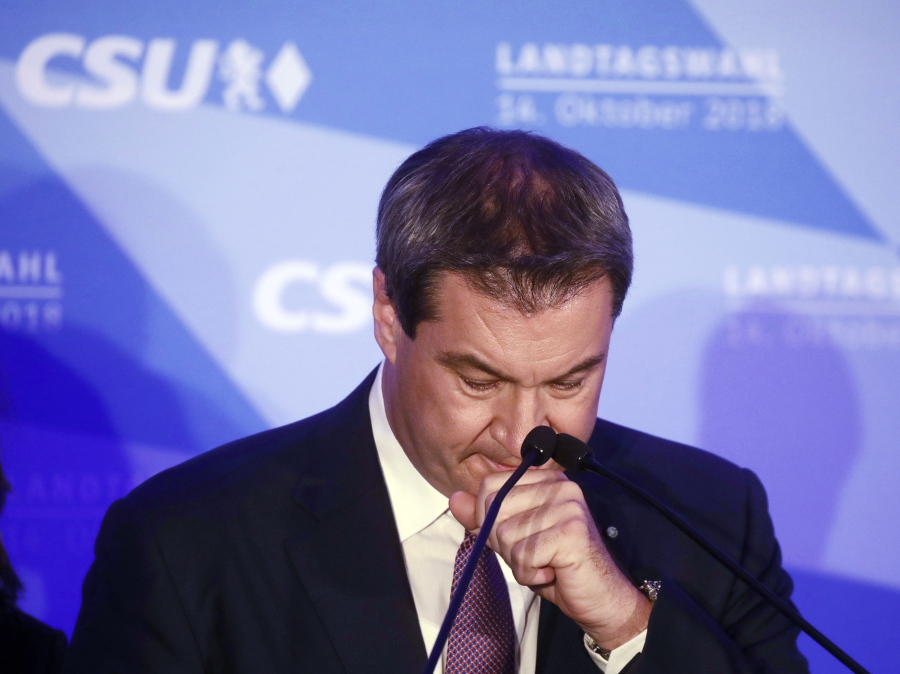 Bavarian governor Markus Soeder reacts during his first appearance after the first exit polls for the Bavarian state election in Munich, southern Germany, Sunday, Oct. 14, 2018.