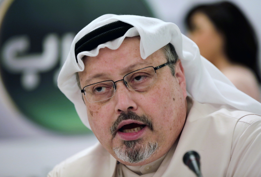 Saudi journalist Jamal Khashoggi speaks during a press conference in Manama, Bahrain. The disappearance of Khashoggi, during a visit to his country’s consulate in Istanbul on Oct. 2, 2018, raises a dark question for anyone who dares criticize governments or speak out against those in power: Will the world have their back?
