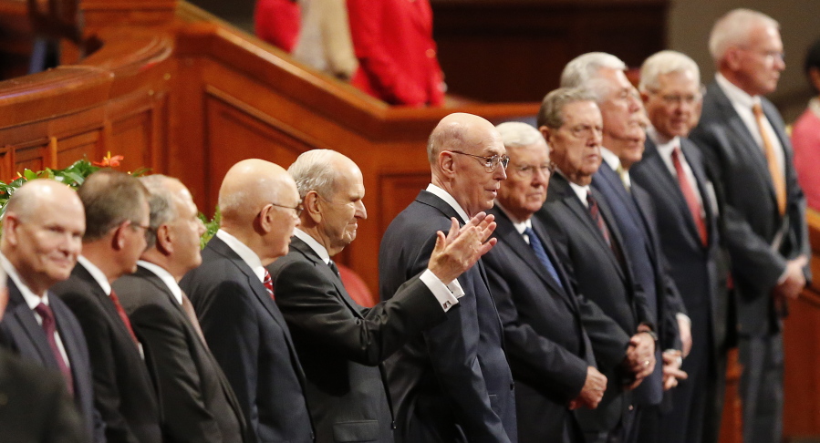 The Church of Jesus Christ of Latter-day Saints President Russell M. Nelson, center, greets the twice-annual conference of The Church of Jesus Christ of Latter-day Saints Saturday, Oct. 6, 2018, in Salt Lake City. Mormon leaders delivered spiritual guidance and church news as the faith's conference kicks off in Salt Lake City one day after the faith announced it was renaming the famed Mormon Tabernacle Choir to drop the word Mormon.