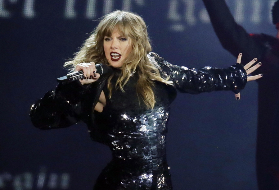 Taylor Swift performs during her “Reputation Stadium Tour” opener in Glendale, Ariz. Swift will open the “2018 American Music Awards.” The singer made the announcement Tuesday, Oct.