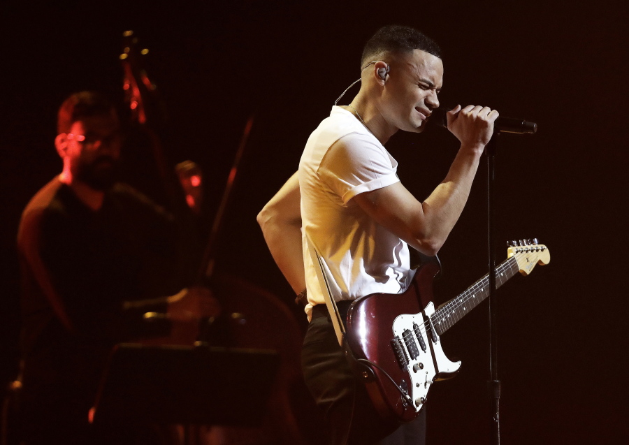 Tauren Wells performs during the Dove Awards on Tuesday in Nashville, Tenn.