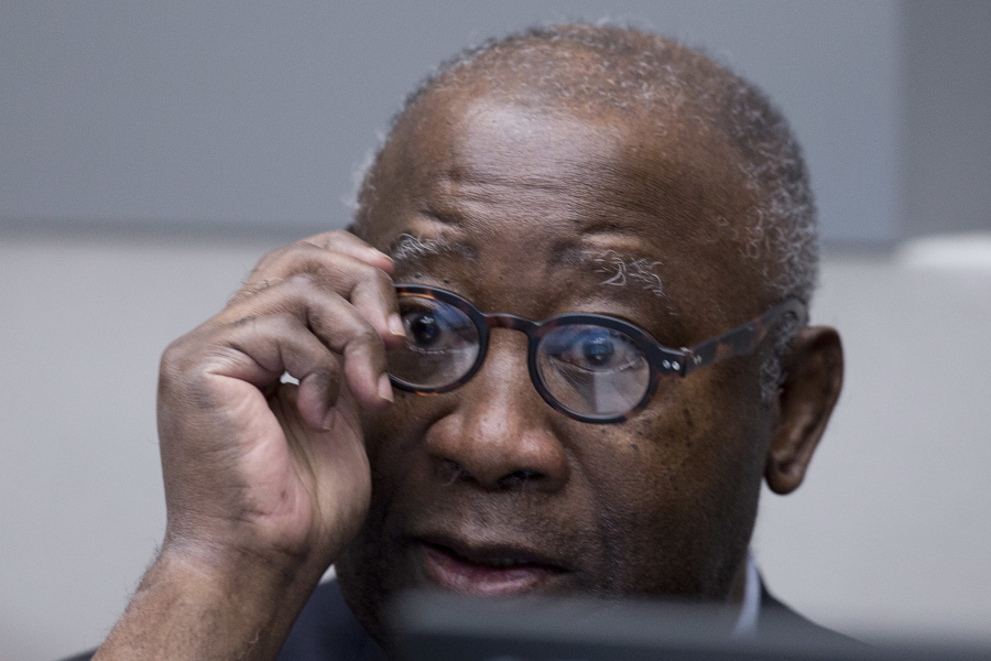 Former Ivory Coast president Laurent Gbagbo waits for the start of his trial at the International Criminal Court in The Hague, Netherlands. International Criminal Court prosecutors urged judges Monday Oct. 1, 2018, to continue the trial of former Ivory Coast President Laurent Gbagbo and a government ex-minister on trial for their alleged involvement in deadly violence that erupted after the country’s disputed 2010 presidential election.