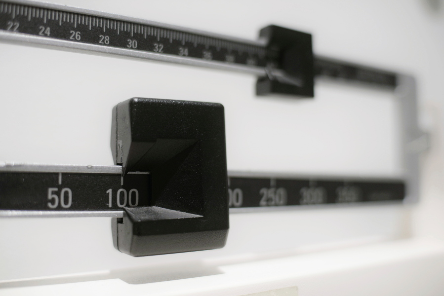 A closeup of a beam scale in New York. New research, published Tuesday in the Journal of the American Medical Association, suggests obesity surgery may dramatically lower the danger of heart attacks and strokes in people with diabetes. The study reinforces evidence that the benefits of stomach-shrinking surgery extend beyond weight loss.