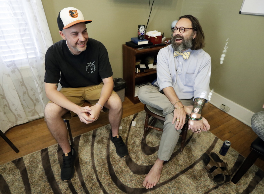 In this Oct. 8, 2018, photo, Tim Nolen, left, participates in a relapse prevention group session with counselor Bob Benson, right, at a treatment facility run by Buffalo Valley Inc. in Nashville, Tenn. Nolen has no health insurance coverage and his treatment for opioid addiction is funded by a grant program Congress approved in 2016 under the 21st Century Cures Act.
