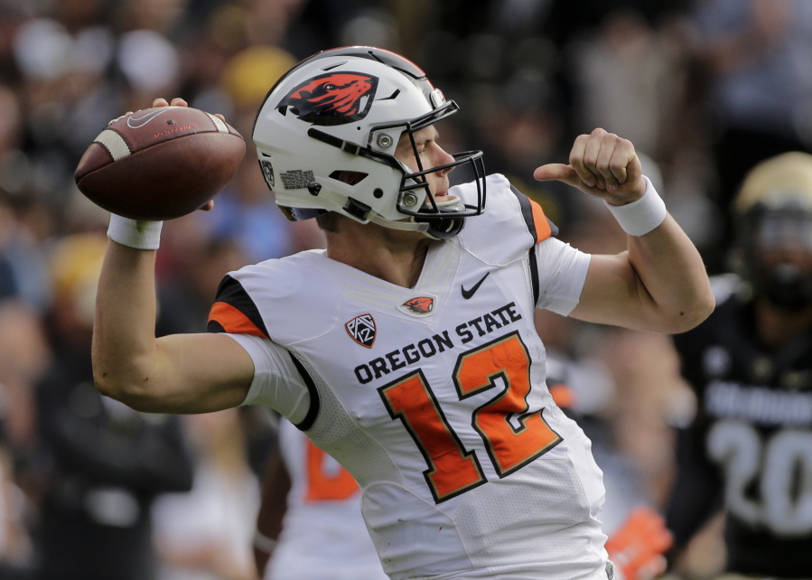 Oregon State quarterback Jack Colletto (12) looks to pass against Colorado during the first half of an NCAA football game, Saturday, Oct. 27, 2018, in Boulder, Colo.