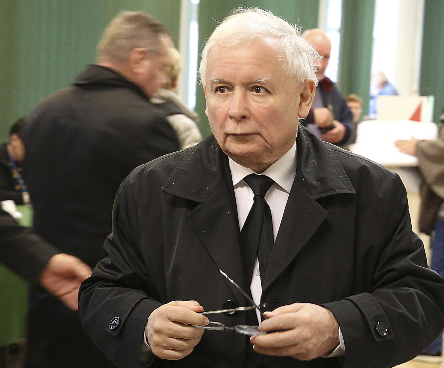 The leader of Poland’s ruling right-wing party, Jaroslaw Kaczynski, casts his ballot in local elections that were the test of support for the party, whose policies have produced street protests and repeated clashes with European Union leaders,in Warsaw, Poland, Sunday, Oct.