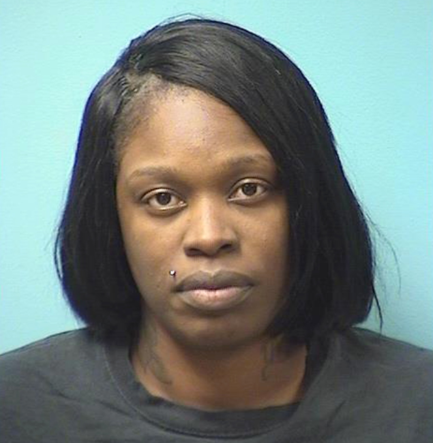 This undated photo provided by the Stearns County (Minn.) Jail shows Tiesha Monique Moore. Moore, a fugitive from Minnesota who taunted authorities on social media by vowing that she’d “never be caught” has been arrested in northern Indiana. Moore was apprehended Monday, Oct. 10, 2018, in Michigan City, about 50 miles east of Chicago. She was wanted on 16 outstanding warrants, all from Minnesota.